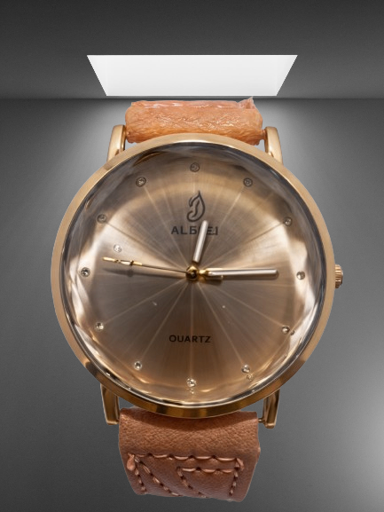 Rose gold watch with grey background and light shining above 