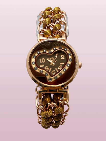 brown bracelet watch with pink backround