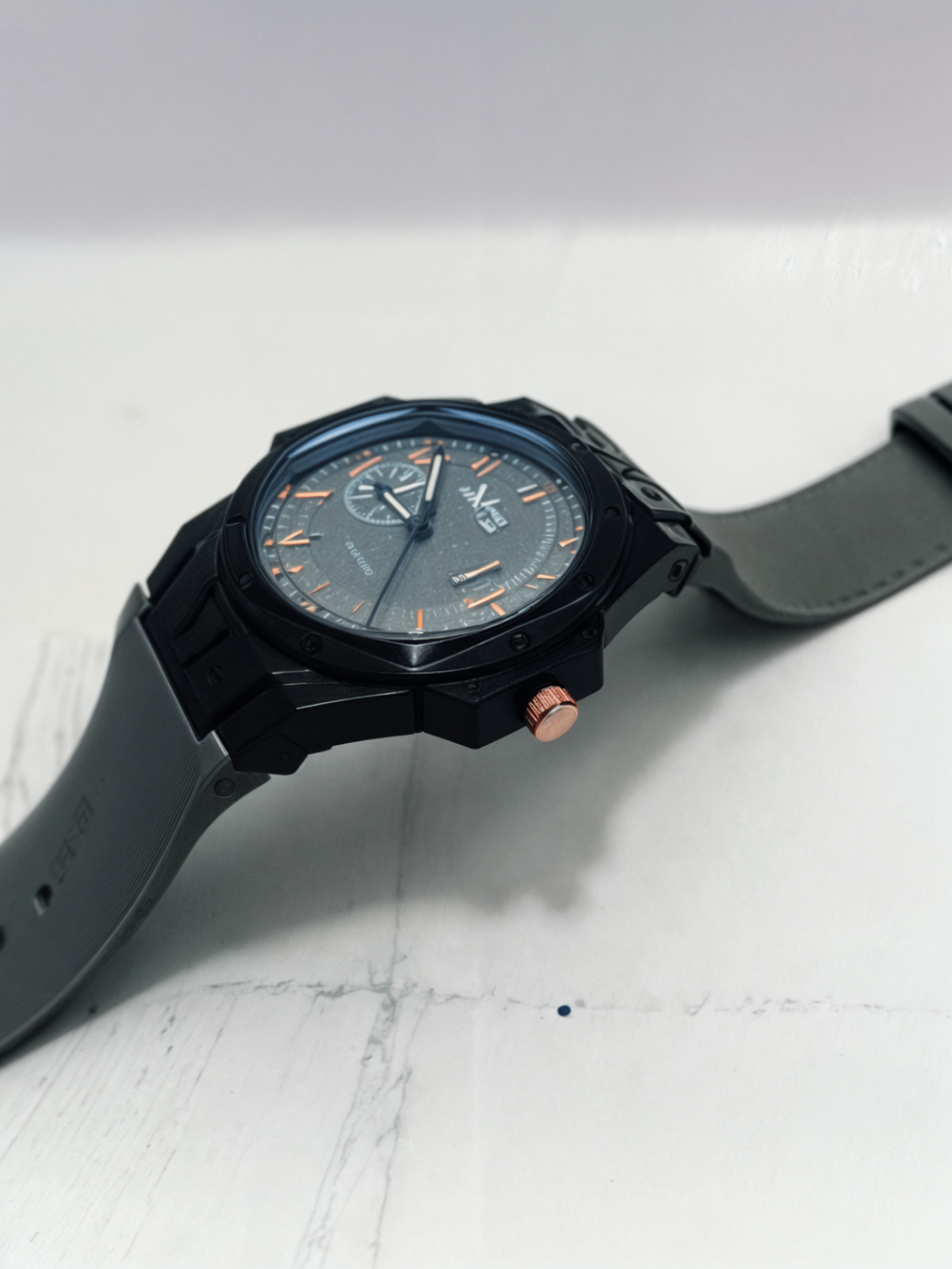 black and grey watch with silicon strap watch